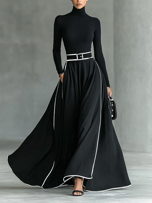 Gina – Vestido Maxi Negro con Costuras Blancas, Cuello Alto y Manga Larga