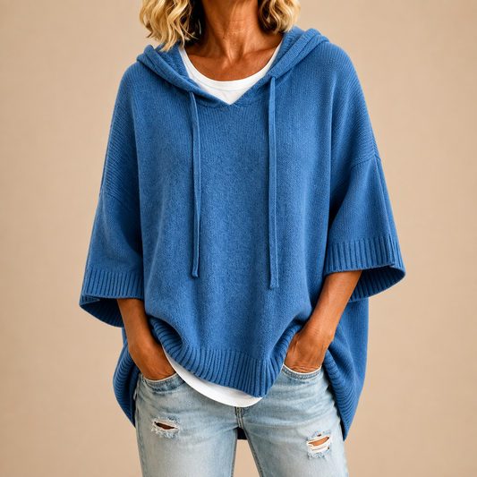 Poncho tejido con capucha azul